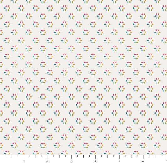 Pattern of colourful dots in a circle on a white backgrround.