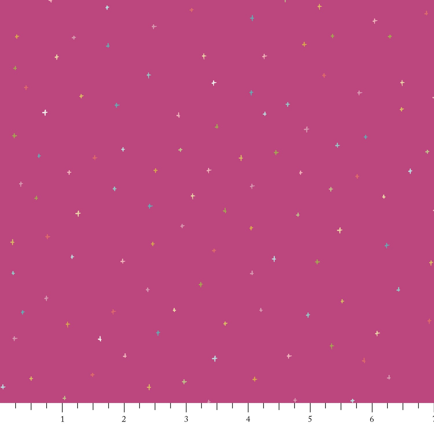 Pink fabric with small colorful star patterns on a pink background